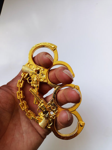 Boxer o Puño americano con diseño PISTOLAS DORADO