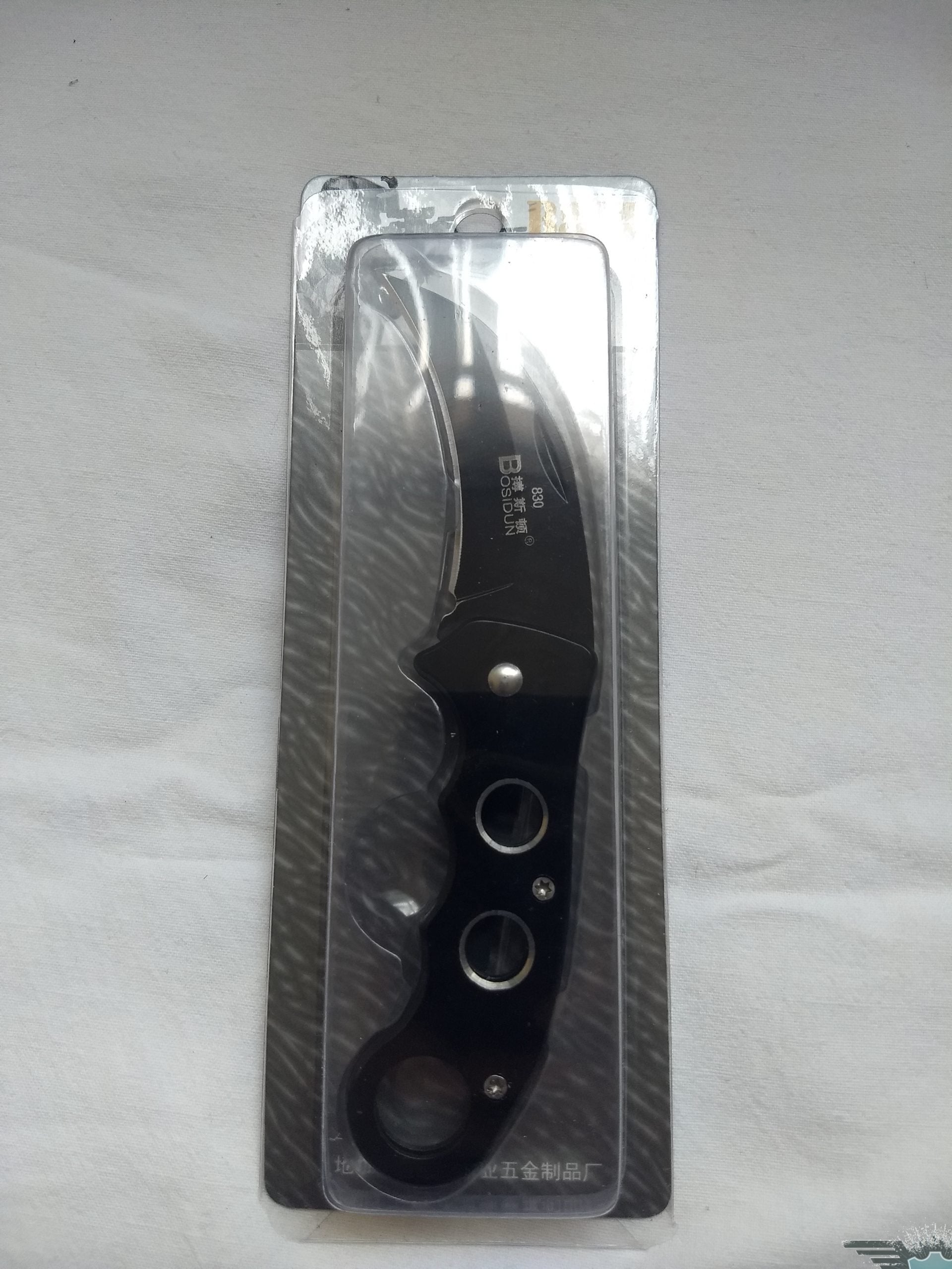 Navaja tipo KARAMBIT abatible